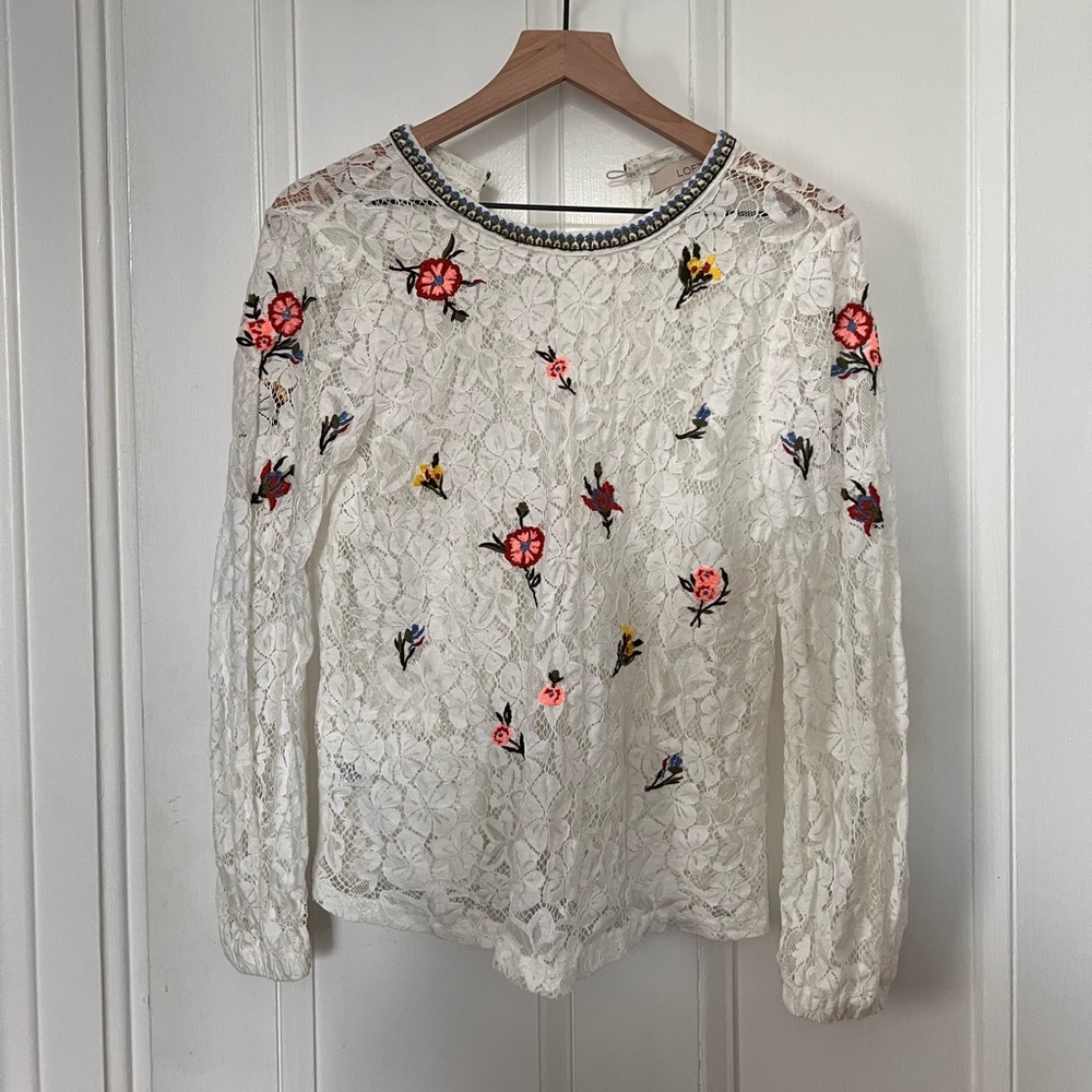 Lace top with embroidered flowers